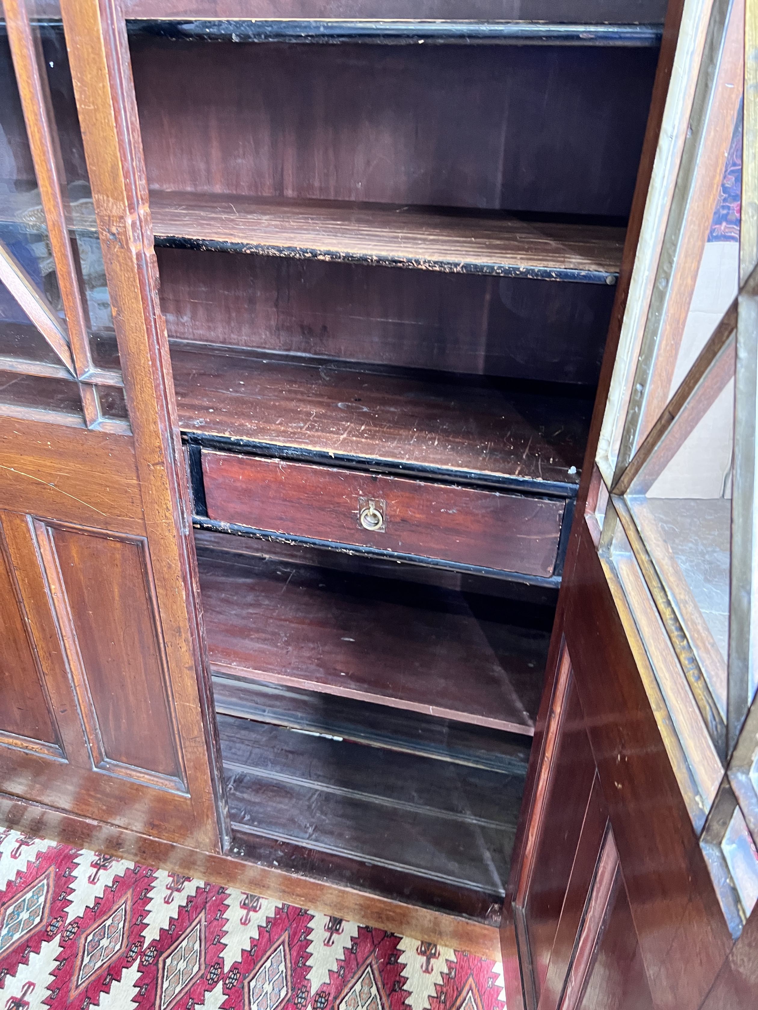 A Victorian glazed mahogany bookcase, length 120cm, depth 39cm, height 228cm
